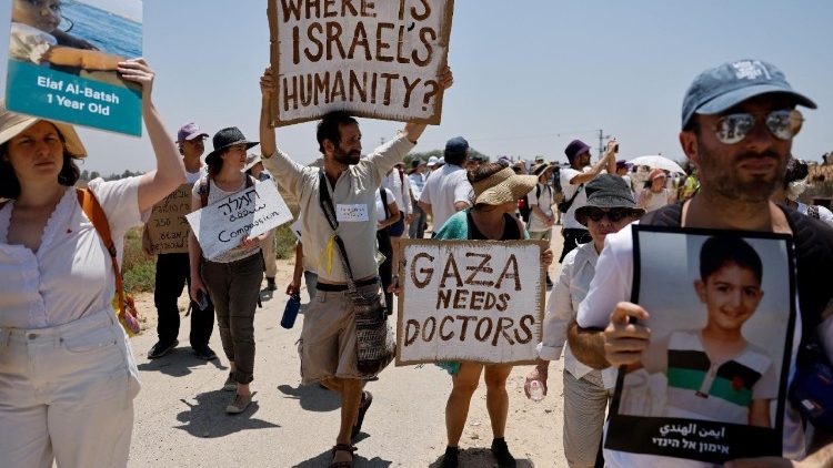 Israeli Jews and Arab activists march from Tel Aviv to the Gaza border on 6 June to demand the end of the war in Gaza