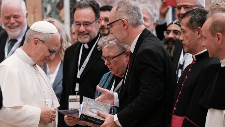Dr. Paul Gavrilyuk presents the International Orthodox Theological Association pamphlet to Pope Leo XIV on June 7, 2025